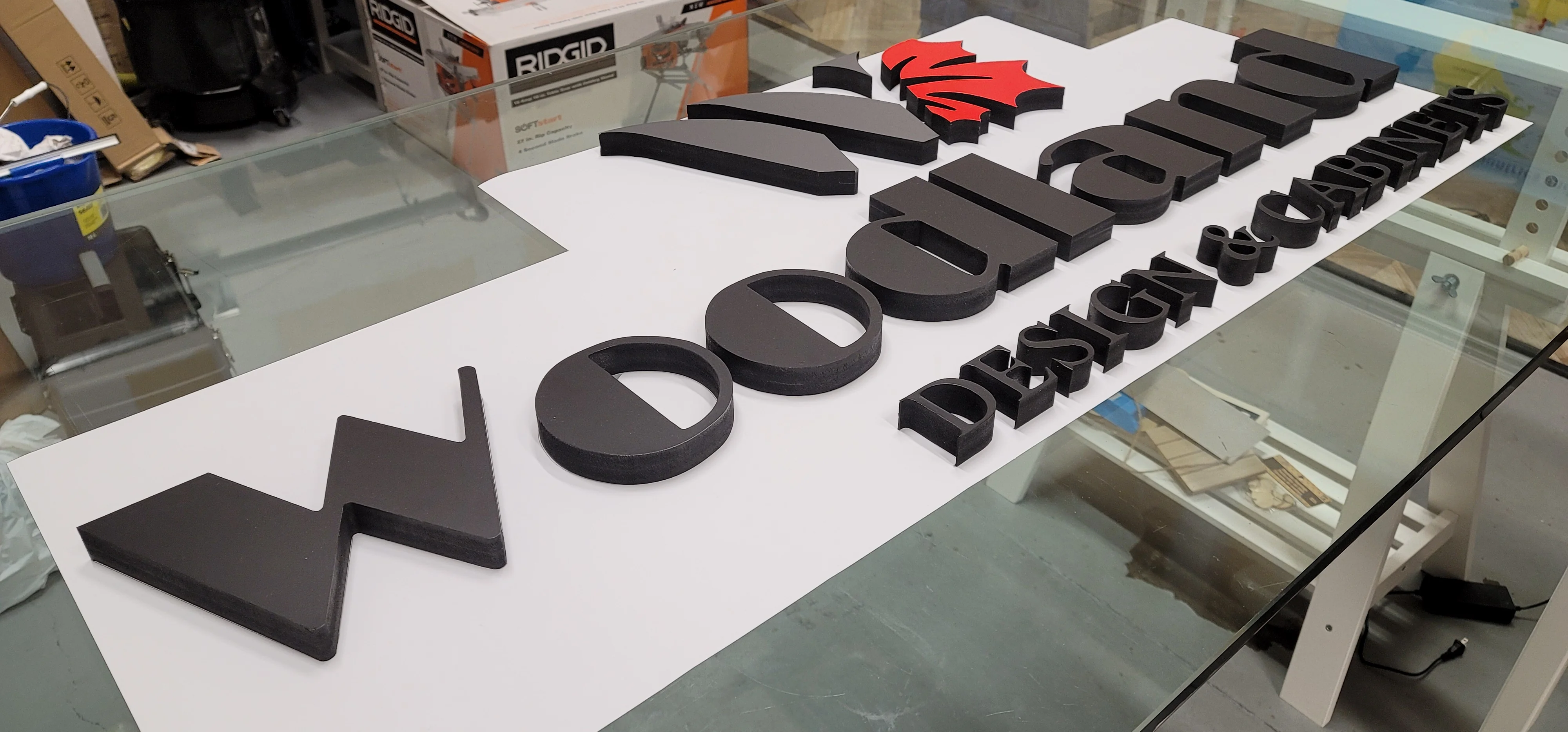 Custom sign design at Kerem Sign's North York studio